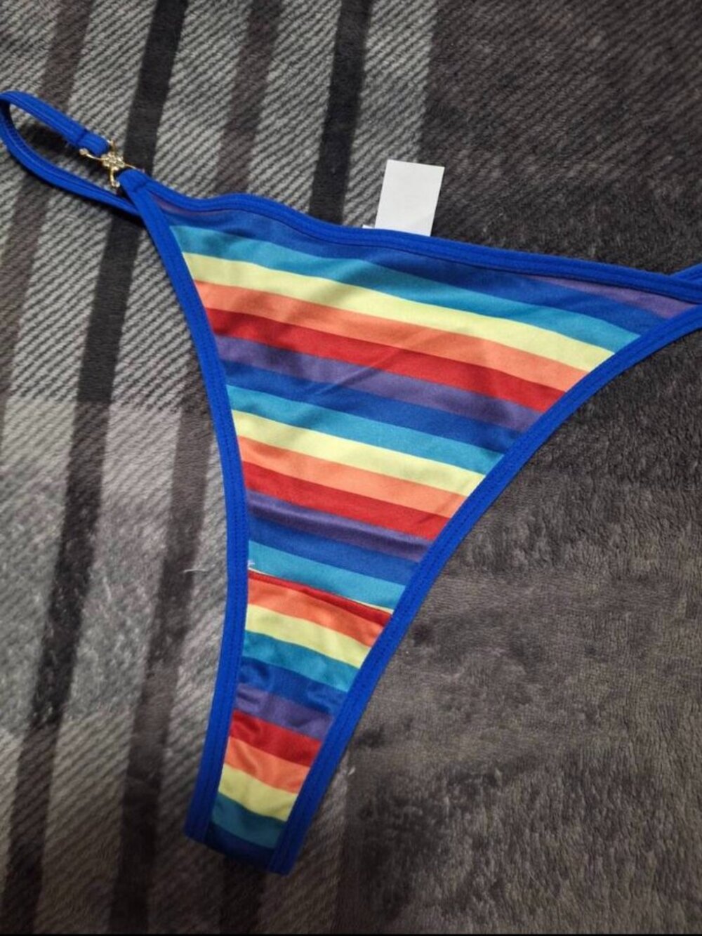 Stylish and sexy vibrant striped thong panties, size M